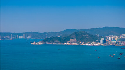 Feb 9 2025 Panoramic View of Coastal Cityscape with Harbor