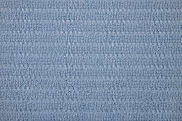 Textile close up of a light blue  fabric, fabric texture as a background.