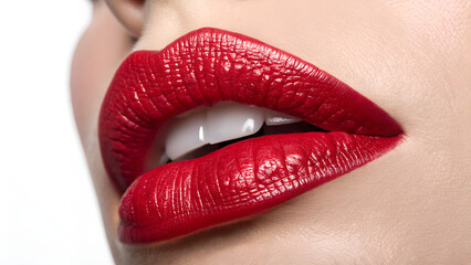 Obraz premium Close-Up of Glossy Red Lips with White Teeth in High Detail