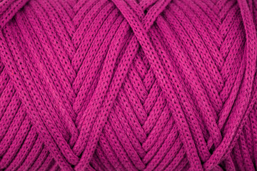 Pink  close up of a roll rope, ropes texture as a background.