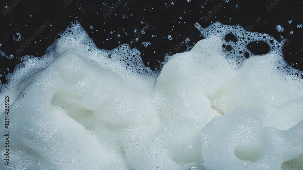 Aufkleber white foam texture on dark background for creative design projects