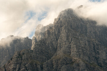 clouds over mountain peak abstract nature landscape showing rocky cliff face closeup on Jonkershoek, Western Cape, South Africa