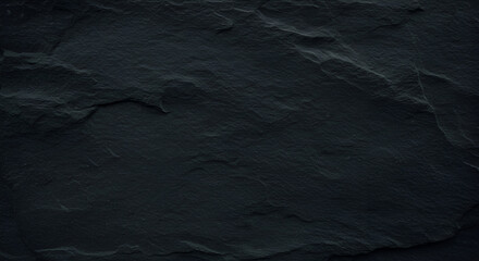 A blackboard or black stone texture with an empty space for text.