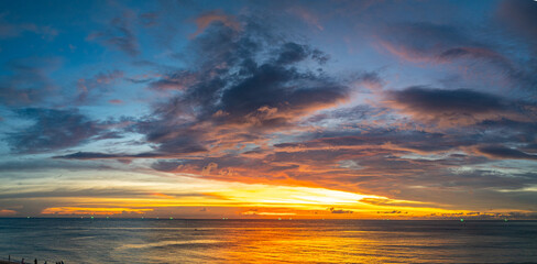 aerial view beautiful sky in sunset at horizon at Kata beach Phuket Thailand. .Scene of colorful red sky in sunset..Gradient color. Sky texture, abstract nature background.