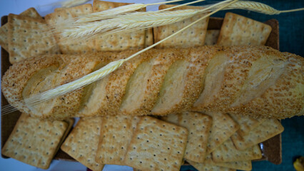 Peanuts in the shape of sweets, paçoca, cornmeal cake and peanut butter on bread