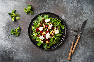 Fresh salad with beetroot, arugula and cheese