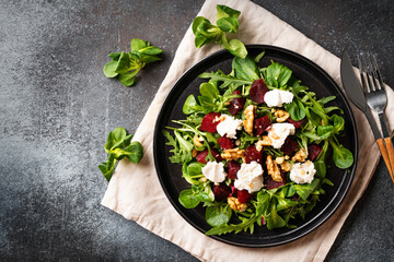 Fresh salad with beetroot, arugula and cheese
