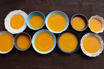 Thanksgiving concept with pumpkin, pumpkin soup .Fall table setting for celebration Autumn holiday with soup