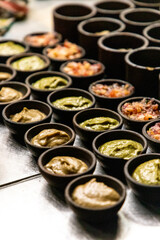 Sauces and Garnishes Ready for Service in Restaurant Kitchen