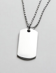 Fototapeta premium Personalized engraved dog tag necklace on a white background.