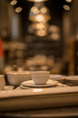 Close up on luxury italian tableware, dishes and glasses.