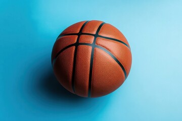 An orange basketball displayed against a calming light blue background