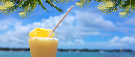 Travel background with drinks Bocal on Caribbean beach.