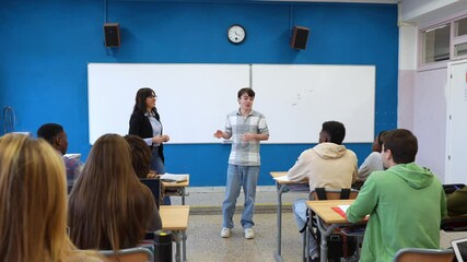 High school students presenting their project in classroom