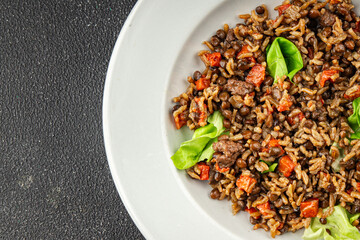 Rice lentil and vegetables snack fresh tasty food dish vegetarian vegan food no meat gourmet food background on the table rustic food top view copy space 