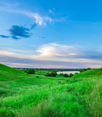 Obraz premium Beautiful, serene landscape with a large body of water in the background