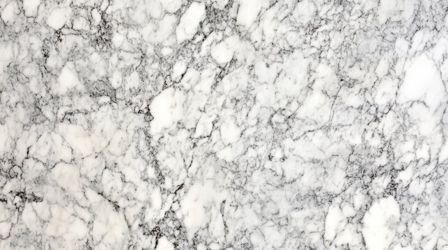 Veined marble surface exhibits a swirling gray pattern texture
