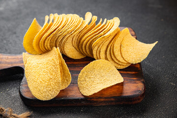 chips potato fast food fresh tasty food dish gourmet food background on the table rustic food top...