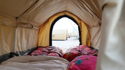 Displaced Syrian Family Seeking Shelter in Tent Amidst Refugee Camps and Challenging Living Conditions