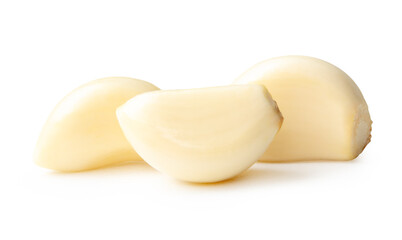 Side view of peeled garlic cloves or pieces in stack isolated on white background with clipping path