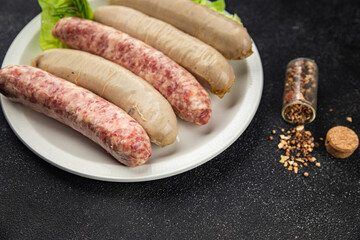 sausages raw meat pork, beef, chicken, lamb fresh tasty food dish gourmet food background on the table rustic food top view copy space