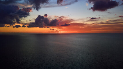 Aerial view of beautiful sunset over the ocean