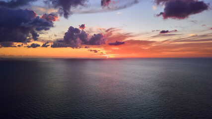 Aerial view of beautiful sunset over the ocean