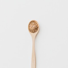 Artistic Presentation of Golden Flaxseeds in Wooden Spoon