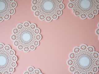 Pink Background with White Doilies