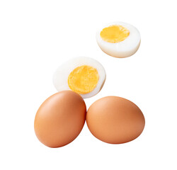 Top view set of two raw chicken eggs and cooked or boiled egg with egg yolk in two halves isolated with clipping path in png file format