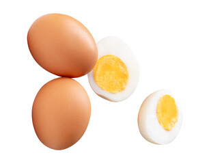 Top view set of two raw chicken eggs and cooked or boiled egg with egg yolk in two halves isolated on white background with clipping path