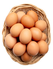 Top view of large group of chicken eggs or hen eggs in stack in wicker basket isolated on white background with clipping path