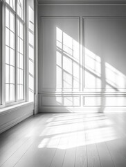 Obraz premium Light Streaming Through Large Windows Illuminates a Minimalist Room With Elegant Moldings in Soft Monochrome Tones