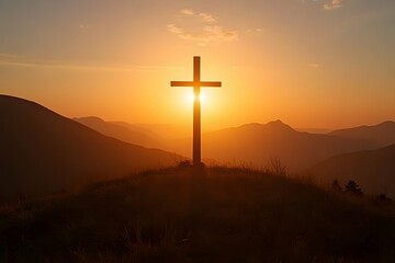 A long shadow of a cross stretching over rolling hills at sunset. 