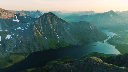 Majestic mountain landscape: sunrise over serene lakes and snowcapped peaks - Powered by Adobe