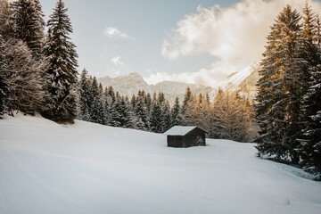 snow covered house in the mountains