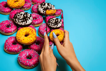 Colorful donuts on a blue background