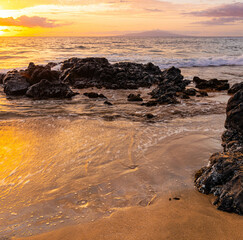 Sunset on The Golden Sand of Mokapu Beach, Wailia, Maui, Hawaii, USA
