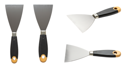 Assortment of Putty Knives with Black Handles on Black Background