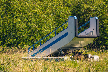 escalators, landing, mobile entrance to a passenger plane at the airport