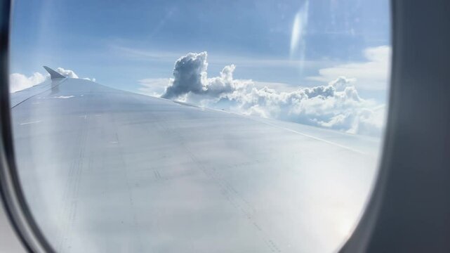 Wing and clouds through window Airbus A380 