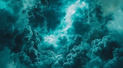 Fototapeta premium Cloudy sky above Teal and blue, heavy cloudscape, and possible stormy weather for use as a dramatic backdrop