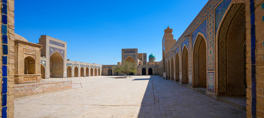 Obraz premium Courtyard of the Kalan Mosque in the Po-i-Kalyan complex of the historic old town of Bukhara in Uzbekistan, Central Asia