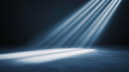 blue spotlights shining on a concrete floor