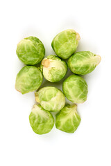 Fresh green Brussels sprouts, isolated on white background. High resolution image.