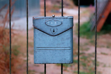 retro mailbox on the gate