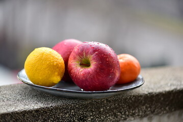 apple and lemon  on a plate