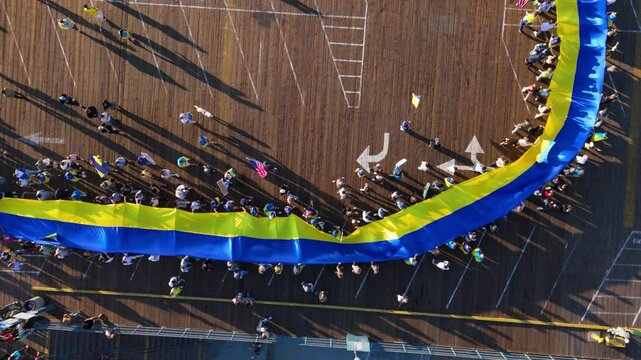 Aerial View of Large Ukrainian Flag on Santa Monica Pier, Los Angeles