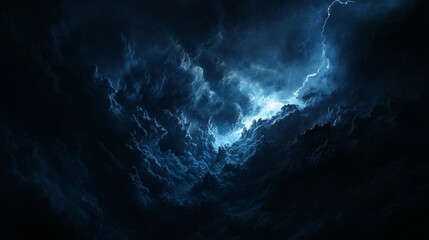 Dramatic night sky with electric blue lightning bolt striking through dark storm clouds. Powerful natural phenomenon. Atmospheric weather background for design