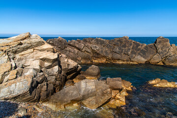 rocks and surf at the seaside